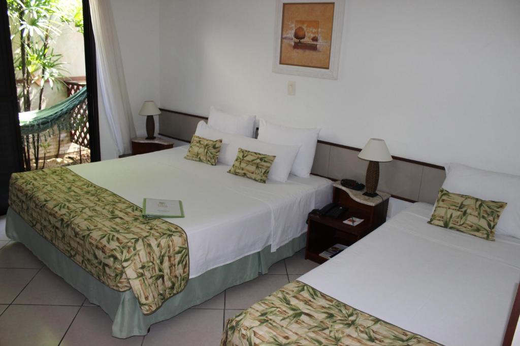 Hotel Ilhas Do Caribe - Na Melhor Regiao Da Praia Da Enseada กัวรูจา ห้อง รูปภาพ
